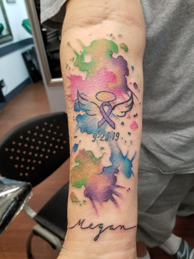 Explore world travel tattoo ideas, creative tattoo ideas in Lodi, available at Emerald Tattoo & Piercing - Lodi