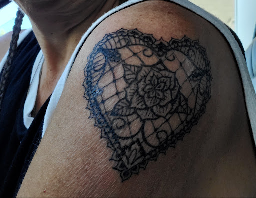Explore collage tattoo ideas, creative tattoo ideas in Alpena, available at Under the Gun Tattoo
