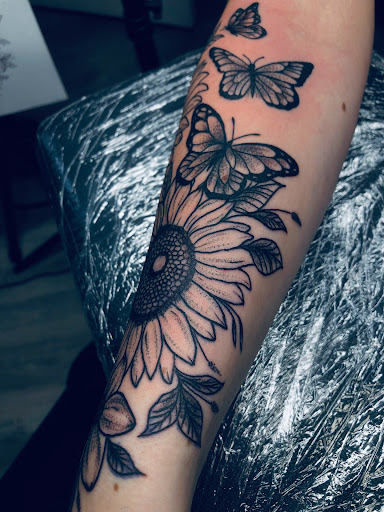 Explore gravestone tattoo ideas, creative tattoo ideas in North Tonawanda, available at Dark Side Ink Tattoo Studio