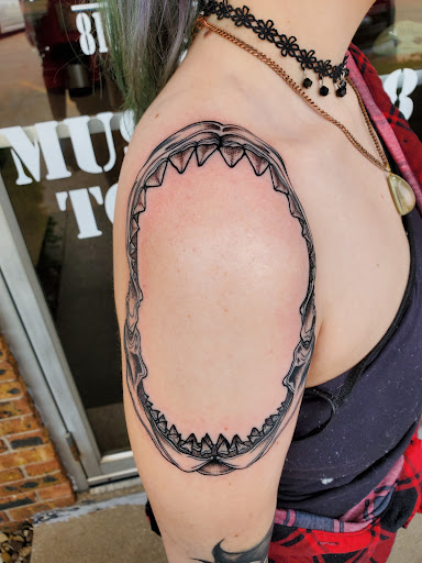 Explore tattoo cover up ideas for women, creative tattoo ideas in Peoria, available at Guerrilla Ink Tattoos