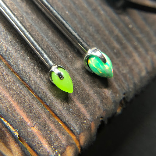 Explore february birth flower tattoo ideas, creative tattoo ideas in Bloomington, available at Crystal Moon Body Arts