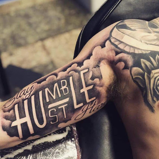 Explore daisy tattoo ideas, creative tattoo ideas in Chicago, available at Studio One Ink Chicago Tattoo Shop