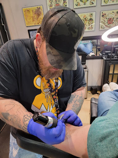 Explore wisdom tattoo ideas, creative tattoo ideas in Fort Wayne, available at Grade A Tattoos and Body Piercing