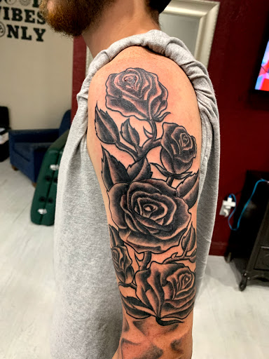 Explore cross cover up tattoo ideas, creative tattoo ideas in Cape Coral, available at UNRIVALED INK