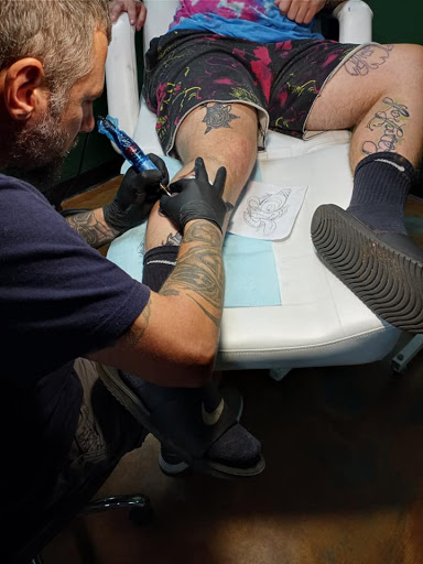 Explore labyrinth tattoo ideas, creative tattoo ideas in Greenwood, available at Emerald City Tattoos