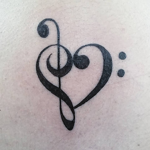 Explore trout tattoo ideas, creative tattoo ideas in Tucson, available at Sacred Art Tattoo Studio