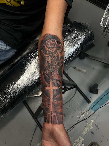Explore tattoo ideas with roman numerals, creative tattoo ideas in Mcallen, available at House of Tattoos