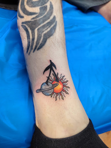 Explore moon tattoo ideas for females, creative tattoo ideas in Benton, available at Spectrum Tattoo