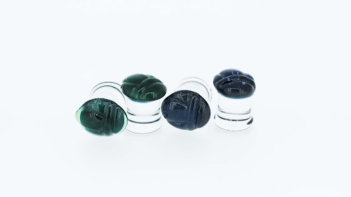 Explore sleeve tattoo ideas for women, creative tattoo ideas in Des Moines, available at Axiom Body Piercing Studio