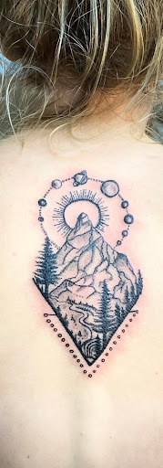 Explore sticker sleeve tattoo ideas, creative tattoo ideas in Traverse City, available at Pinups & Needles