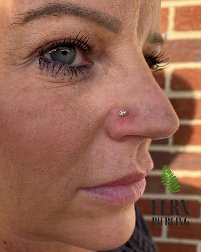 Explore butterfly flower tattoo ideas, creative tattoo ideas in Greensboro, available at Fern Piercing and Fine Jewelry