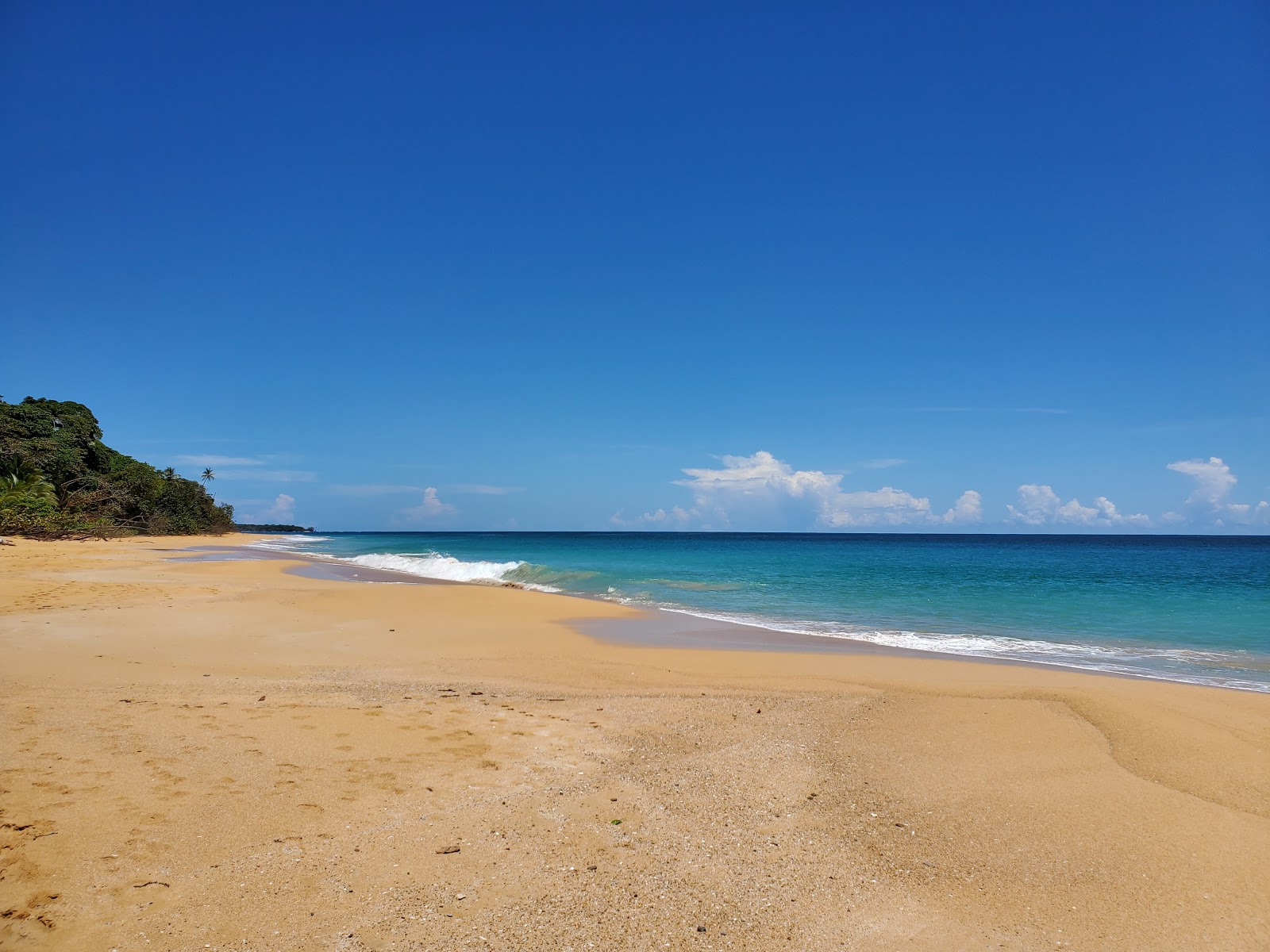 Foto von Escondida Strand mit beiger sand Oberfläche