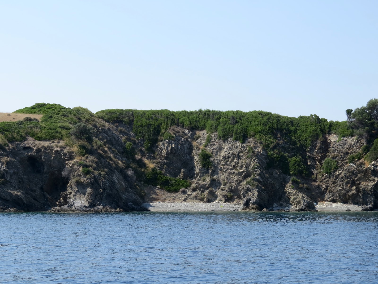 Valokuva Sithonia beachista. pinnalla beige-soraa:n kanssa