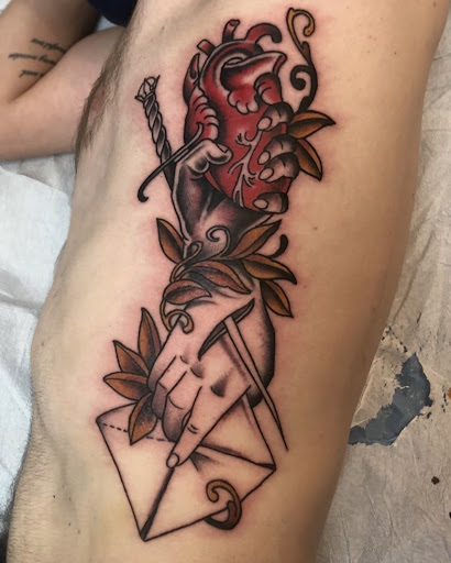 Find dc tattoo ideas for your next unique tattoo in Worcester at Ideal Americana Tattoo Company