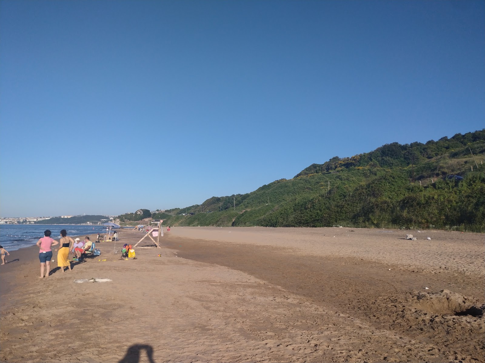 Φωτογραφία του Kumbaba plaj με καθαρό νερό επιφάνεια