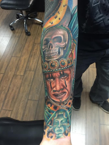 Explore cover up tattoo ideas on thigh, creative tattoo ideas in Linden, available at Fredricks Tattoo Gallery