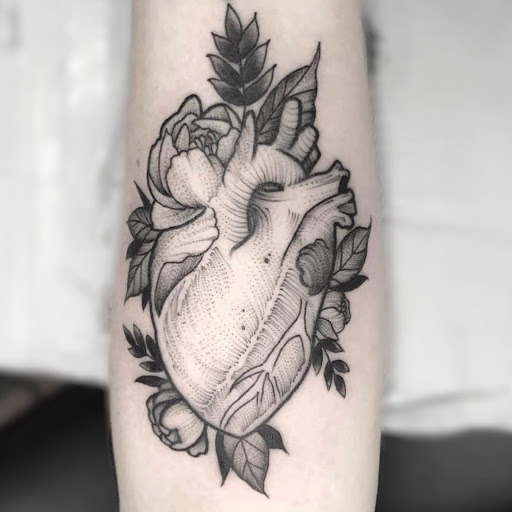 Explore tattoo ideas on breast, creative tattoo ideas in Dayton, available at Blue Byrd Tattoo