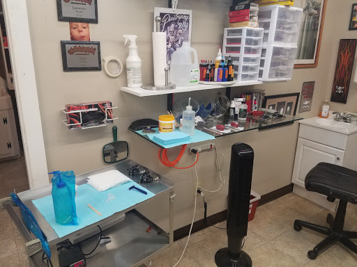 Tattoo Shop «Grapes Designs», reviews and photos, 103 S 3rd St, Scottsville, KY 42164, USA