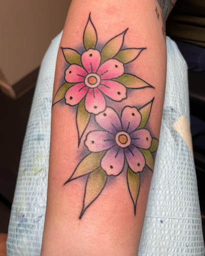 Explore totem pole tattoo ideas, creative tattoo ideas in Muskogee, available at Spurlocks Emporium