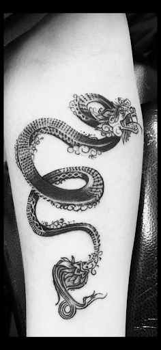 Explore badass neck tattoo ideas, creative tattoo ideas in Rogers, available at Ink Solutions Tattoo