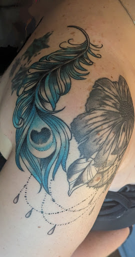 Explore pinterest flower tattoo ideas, creative tattoo ideas in Dickson, available at Lotus Tattoo Studio