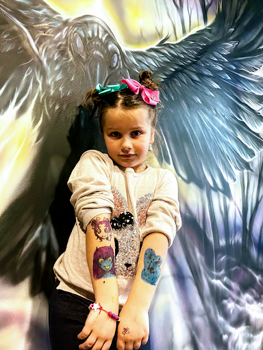 Explore tattoo name ideas on arm, creative tattoo ideas in Clarksville, available at Dark Raine Tattoo