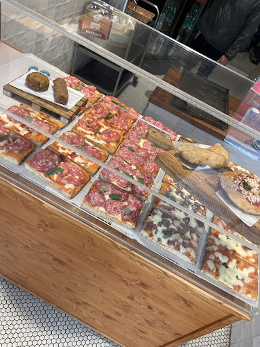 Reacties en beoordelingen van Mangia Pizza Zeedijk
