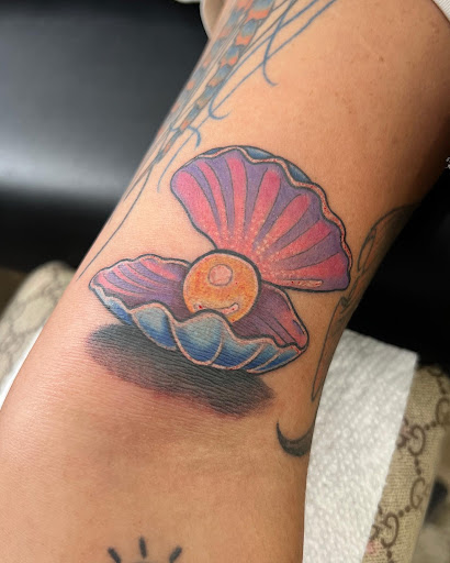 Explore simple silver lining tattoo ideas, creative tattoo ideas in Deerfield Beach, available at A Stroke of Genius Tattoos of Deerfield Beach