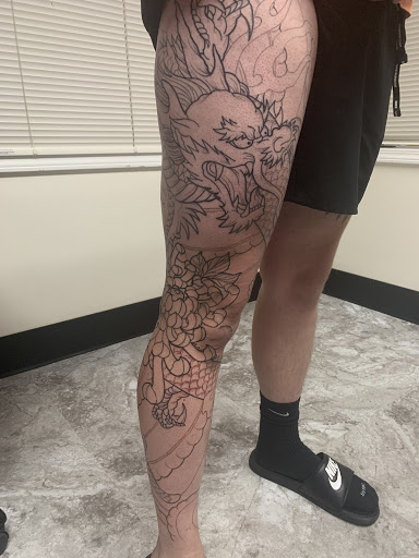 Explore deceased dog tattoo ideas, creative tattoo ideas in Junction City, available at New Era Tattoo Studio