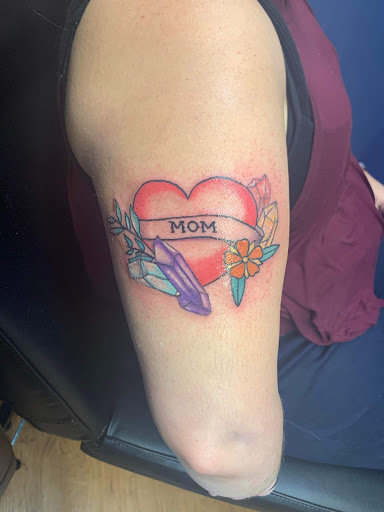 Explore tattoo ideas for top of foot, creative tattoo ideas in Williamston, available at Inkd Tattoo Parlor