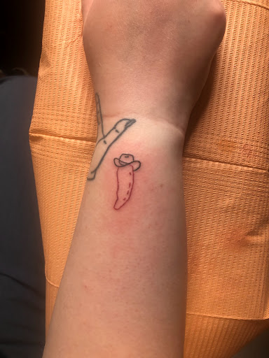 Explore wrist wrap tattoo ideas, creative tattoo ideas in Harrisonburg, available at Liberty Street Tattoos