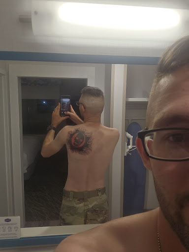 Explore floral tattoo cover up ideas, creative tattoo ideas in Duncanville, available at Studio Fourteen Tattoos