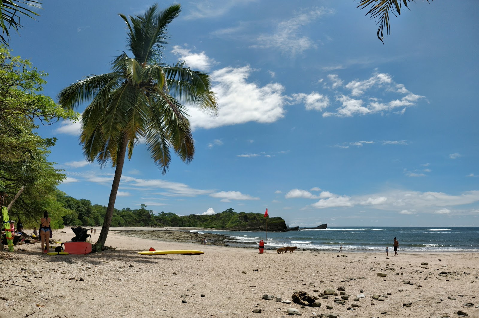 Fotografija Playa Pelada z svetel pesek in kamni površino