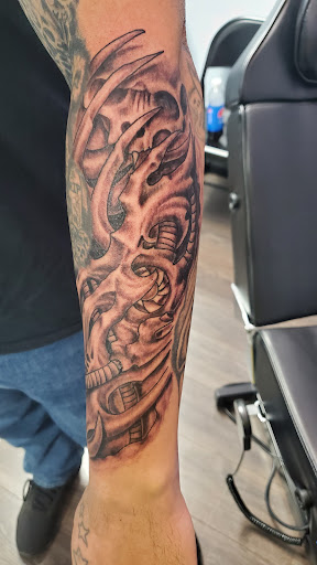 Explore rose cover up tattoo ideas, creative tattoo ideas in Alliance, available at Crossroads Tattoos