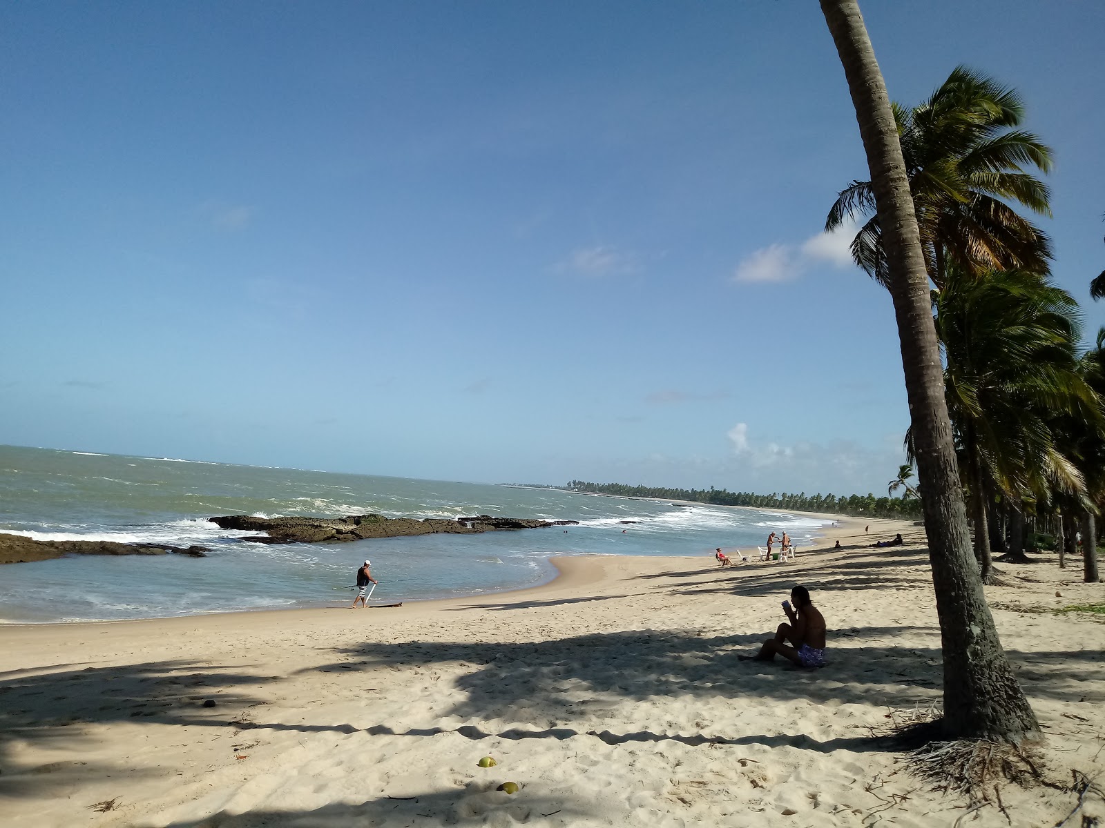 Foto di Toquinho Beach con una superficie del sabbia beige fine