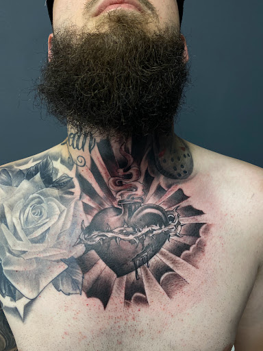 Explore dogwood tattoo ideas, creative tattoo ideas in Brooklyn, available at Empire Ink Tattoo Studio