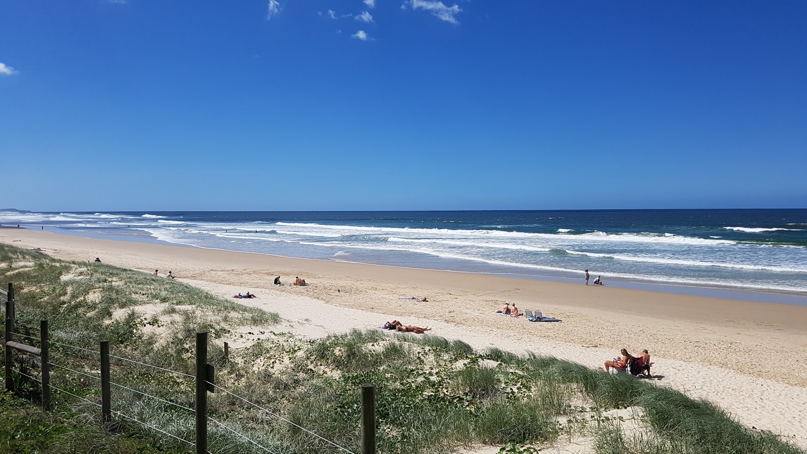 Photo of Coolum Beach surrounded by mountains