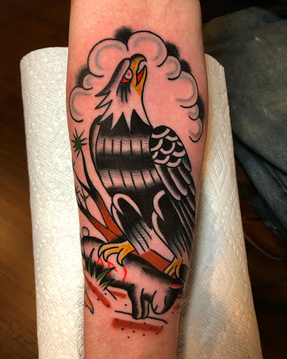 Explore knee cap tattoo ideas for men, creative tattoo ideas in Johnson City, available at Gold Cross Tattoo Co.