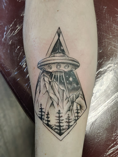 Explore bald head tattoo ideas, creative tattoo ideas in Tahlequah, available at Monochrome Ink