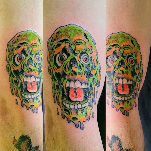 Explore under breast tattoo ideas for females, creative tattoo ideas in Rochester, available at Body Creations Tattoo & Body Piercing