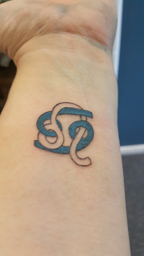 Explore lion tattoo ideas for guys, creative tattoo ideas in Midvale, available at Aloha Tattoos - Award-Winning Utah Ink