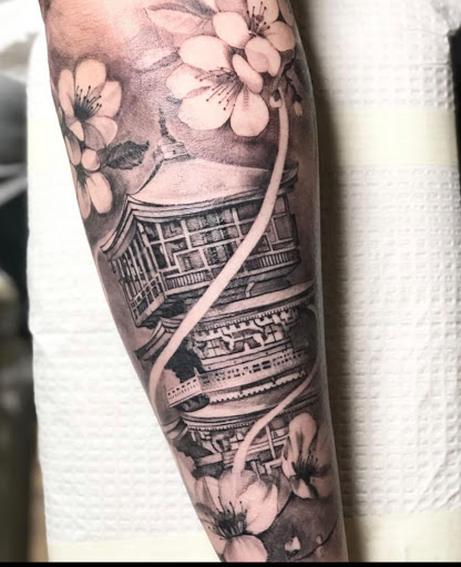 Explore symbol tattoo ideas, creative tattoo ideas in Mount Juliet, available at Division Street Tattoo Company