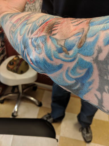 Explore mens tattoos on wrist ideas, creative tattoo ideas in Charleston, available at Holy City Tattooing Collective