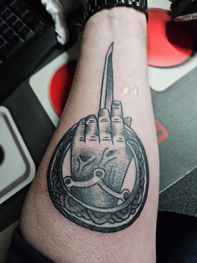 Explore simple silver lining tattoo ideas, creative tattoo ideas in Concord, available at Capital City Tattoo LLC