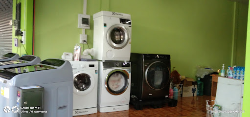 เครื่องซักผ้าหยอดเหรียญและบริการซักท๊อปเปอร์