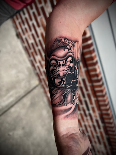 Explore men's knuckle tattoo ideas, creative tattoo ideas in Wallace, available at Artistic Abyss Tattoo Collective