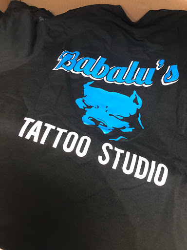 Explore feminine dragon tattoo ideas, creative tattoo ideas in Kearney, available at Babalus Professional Tattoo Studio