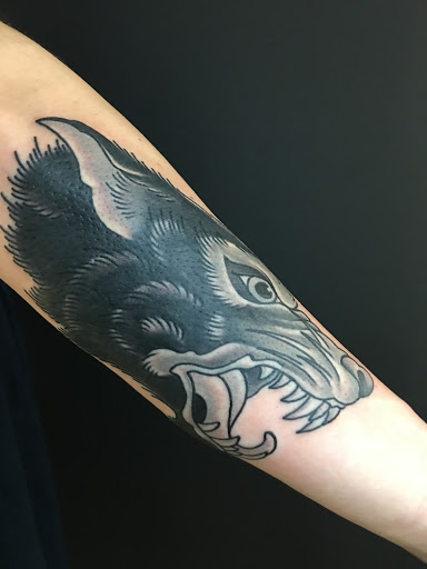 Explore american football tattoo ideas, creative tattoo ideas in Arlington, available at Benchmark Tattoos