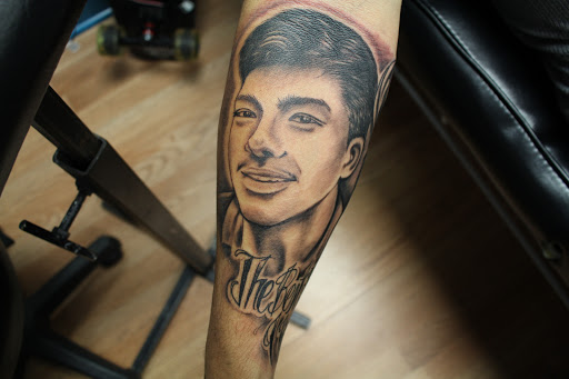 Explore santa tattoo ideas, creative tattoo ideas in Arlington, available at The Chosen One Ink