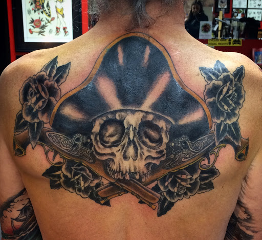 Explore tim burton tattoo sleeve ideas, creative tattoo ideas in Black River Falls, available at Black River Tattoo